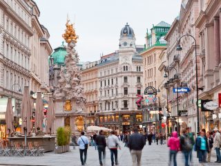 bigstock Tourists On Foot Graben Street 96667106