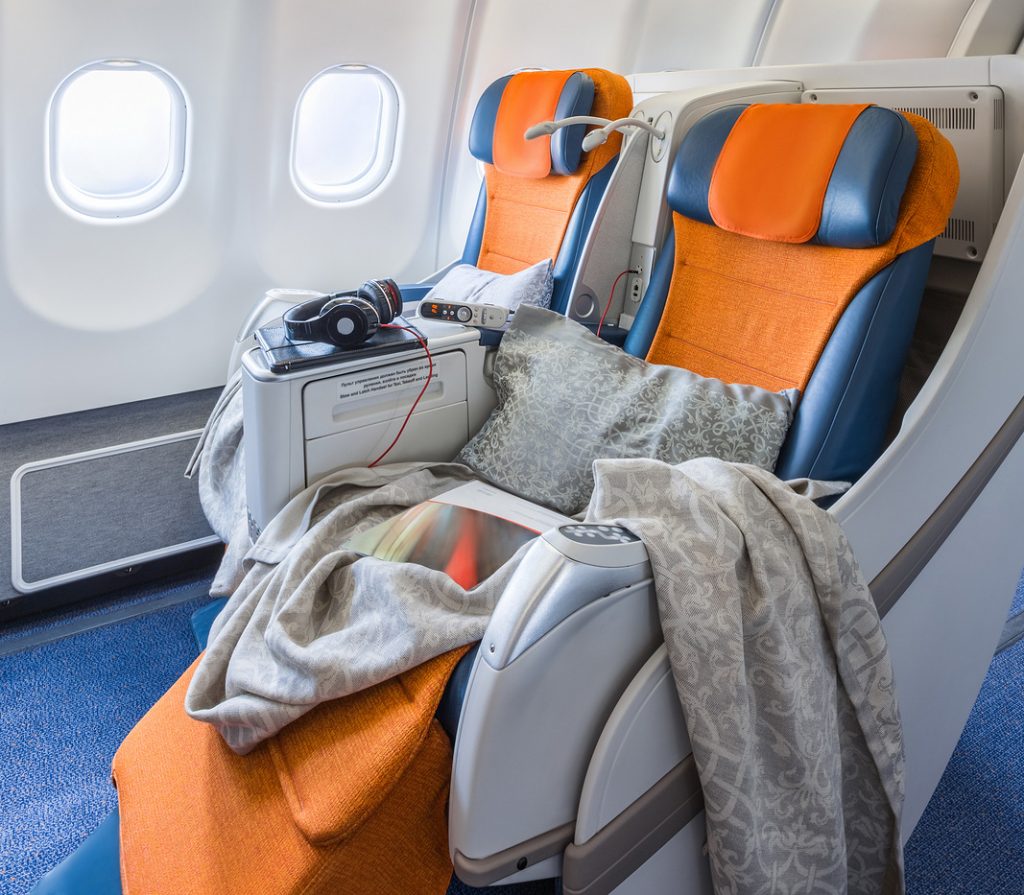 two chairs prepared to sleep in the airplane salon (vertical)